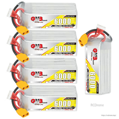 Set layout showing four horizontal GNB 6000mAh packs plus one upright pack, all with yellow XT90 connectors
