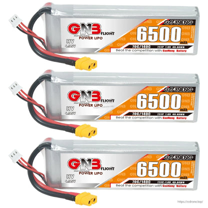 Three GNB 6500 LiHV battery packs lined up, each with XT60 connector and 2S balance plug