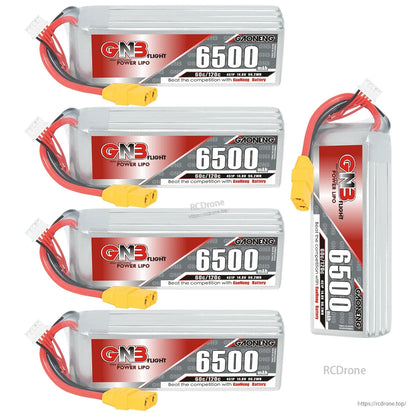Four horizontal GNB 6500 LiPo packs plus one upright pack shown together to display angles