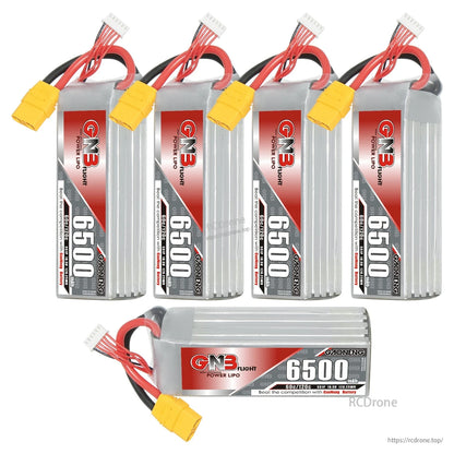 Bundle layout: four upright GNB 6500 packs plus one horizontal pack showing top label and leads