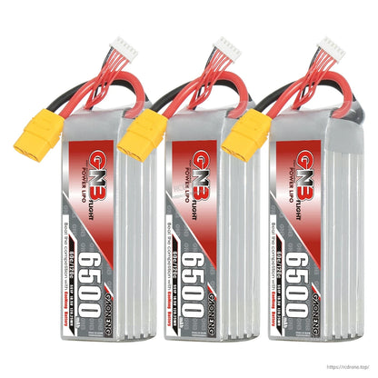 Three GNB 6500 LiPo battery packs lined up, each with XT90 connector and balance lead