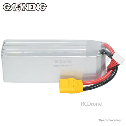 Rear plain-side view of silver GNB battery case with XT90 connector and balance plug visible