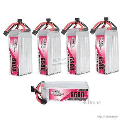 One battery laid flat plus four batteries standing upright, showing different orientations and labels