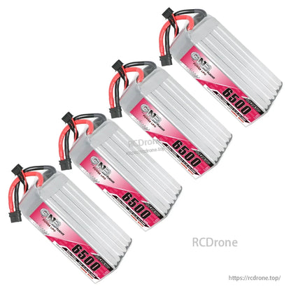 Four LiPo packs displayed diagonally, showing silver casing, label strip, and lead connectors