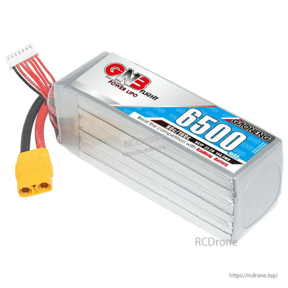 Angled view of GNB 6500 LiPo pack highlighting ribbed aluminum case and yellow XT90 connector
