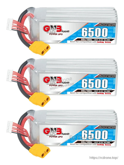 Three GNB 6500 LiPo batteries lined up, each with XT90 connector and balance lead