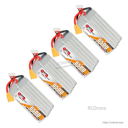 Four GNB 6500mAh LiHV LiPo batteries shown at an angle, highlighting ribbed casing and connectors