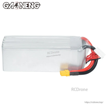 Side view of silver LiPo battery case showing wiring exit, XT60 plug, and balance connector