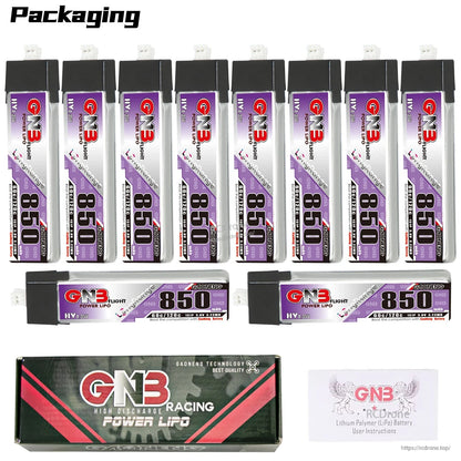 Large packaging display with multiple GNB 850 batteries shown upright and sideways, plus box and manual