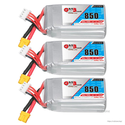 Three GNB 850mAh 3S LiPo batteries stacked, showing labels and XT30 leads