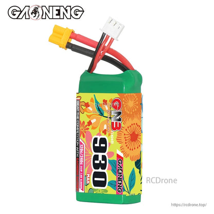 GNB 930mAh battery standing upright, label side with floral wrap and attached leads