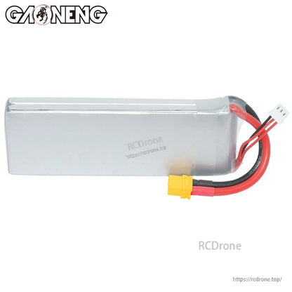 Rear view of LiPo pack with plain silver wrap, showing XT60 and balance leads on right