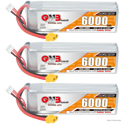 Three GNB HV 3S 6000mAh LiHV LiPo batteries lined up, each with XT60 connector and balance lead