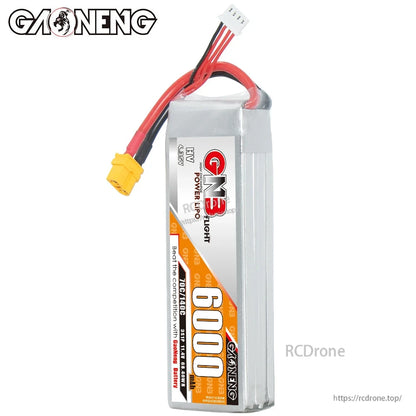Side profile of GNB 3S 6000mAh LiHV LiPo pack showing thickness and wire exit with XT60 plug