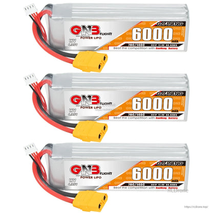 Three GNB HV 3S 6000mAh batteries lined up, labels and XT90 connectors visible