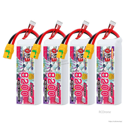 Four GNB 8200mAh LiHV 4S batteries shown together with XT90S anti-spark plugs