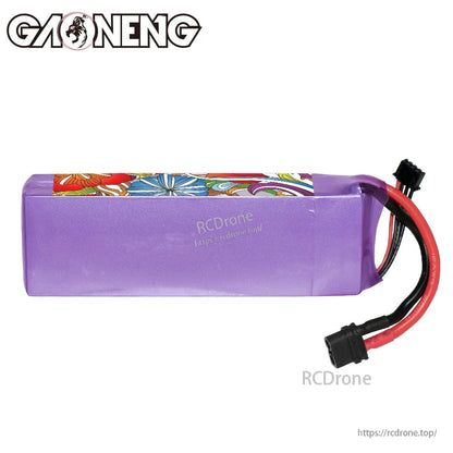 Rear/side view of purple-wrapped LiPo pack showing plain shrink wrap and exiting wires
