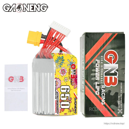 Package contents: GNB 650 battery, GNB Racing box, and user instructions card