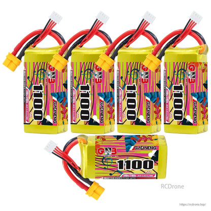 Bundle layout showing four upright 1100mAh batteries plus one horizontal battery with label visible