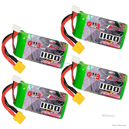 Four GAONENG GNB 1100mAh LiPo batteries arranged diagonally, showing labels, XT60 plugs, and balance leads
