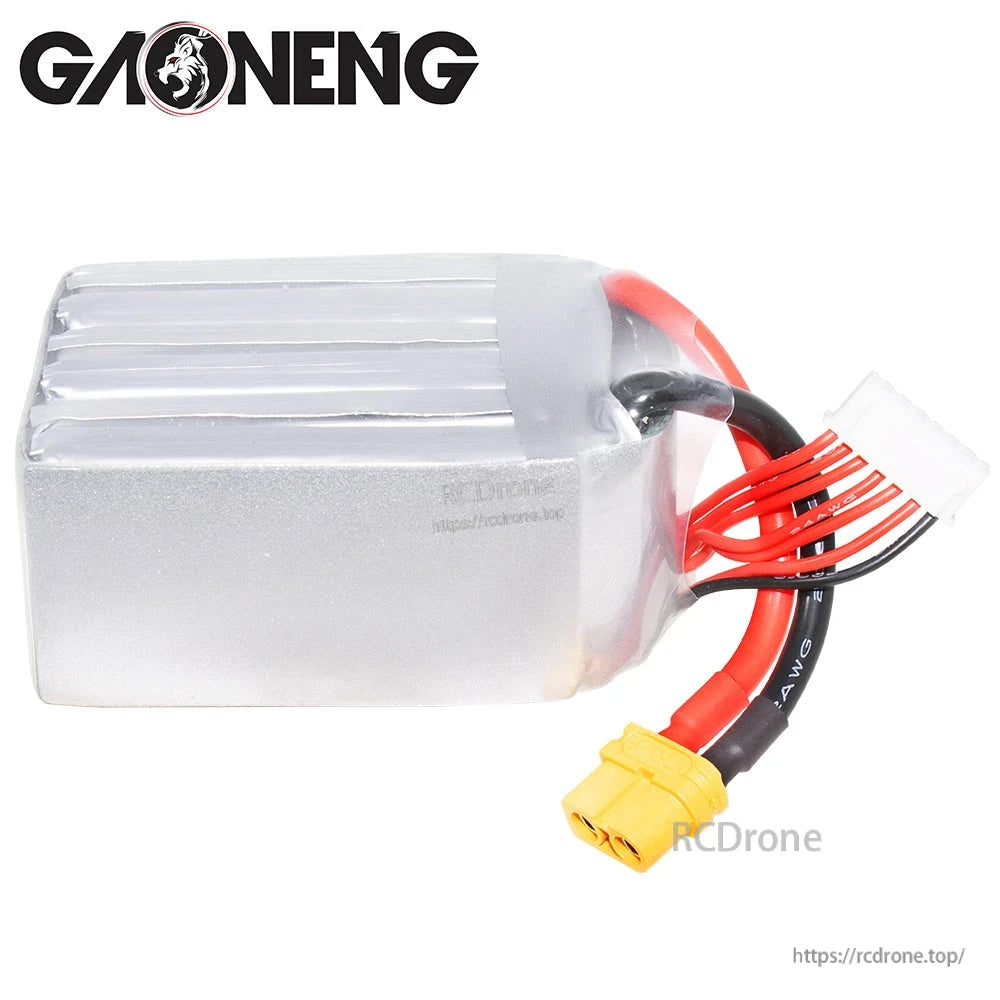 Rear/side view of silver-wrapped LiPo pack showing wire exit, XT60 power lead and white balance plug