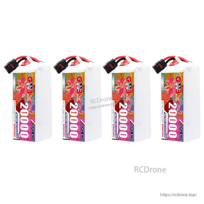 Four upright battery packs displayed in a row, showing front label and top connectors