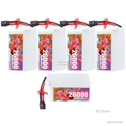 Five batteries shown: four upright plus one horizontal 26000mAh pack with QS8 lead