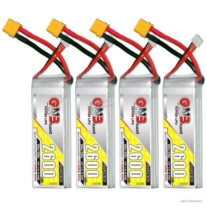 Four GNB 2600mAh LiPo batteries lineup with XT60 connectors and white balance plugs