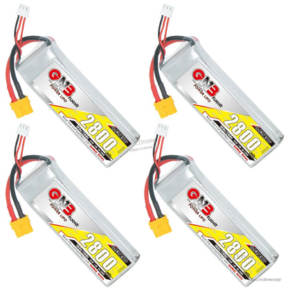Four GNB 2800 batteries arranged diagonally showing label side and XT60 connectors