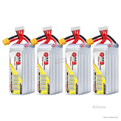 Four GNB 3000mAh LiPo batteries lineup with wiring leads and XT60 connectors visible