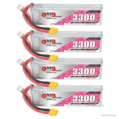 Four GNB 3300mAh 3S LiPo batteries displayed in a set, XT60 power leads visible