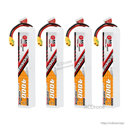 Four-pack display of GNB 4000mAh LiPo batteries standing upright, XT90S connectors visible