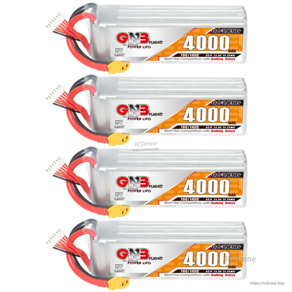 Four GNB 4000mAh battery packs stacked vertically with balance leads and XT60 connectors