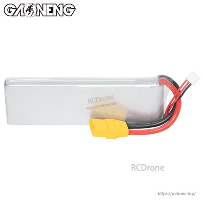 Side profile of the silver hardcase-style battery pack with yellow connector and balance lead