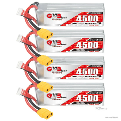 Four GAONENG GNB 4500 LiPo batteries stacked with yellow XT90 connectors and balance leads