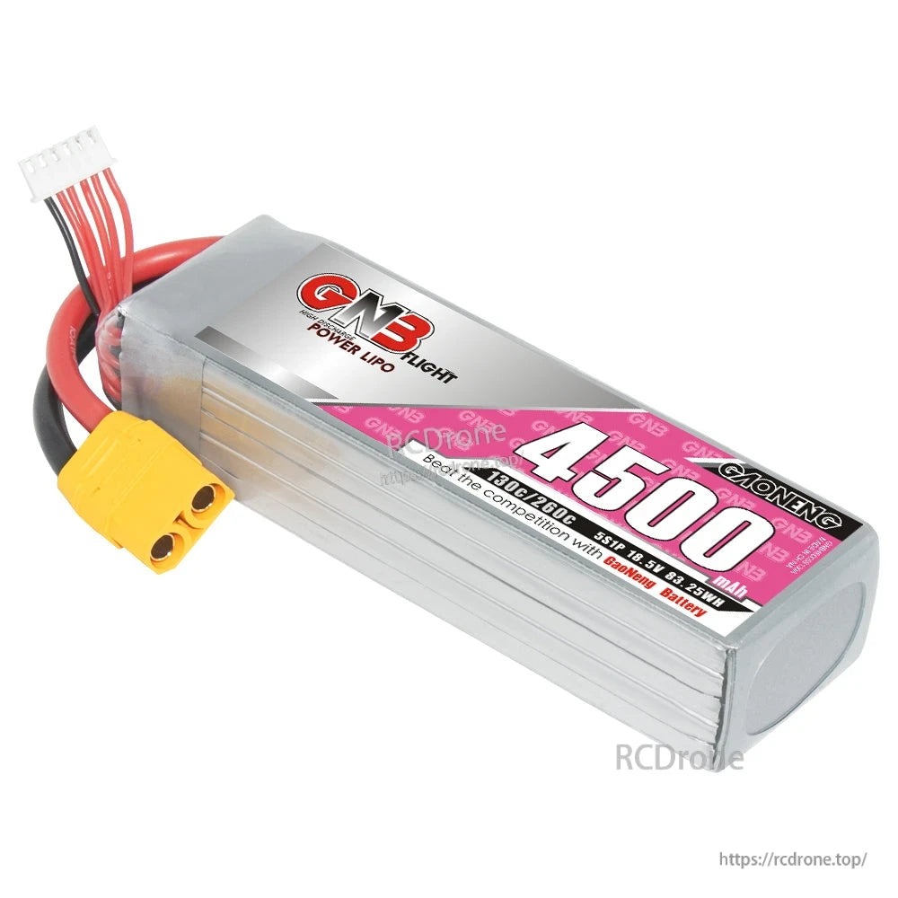 Angled view of GNB 4500 LiPo battery showing front label, ribbed aluminum case, XT90 and balance lead