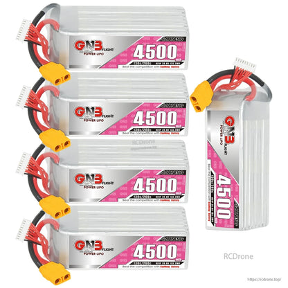 Four GNB 4500 LiPo batteries stacked plus one upright battery showing side profile and XT90 leads