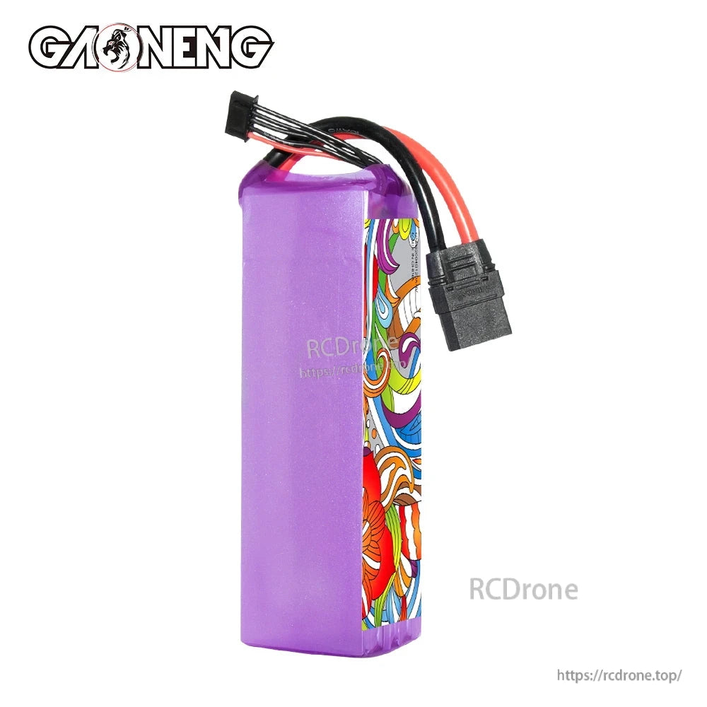 Rear/side view of purple shrink-wrapped battery showing wires, balance lead, and XT90 plug