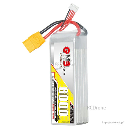 Upright end view of GAONENG GNB 6000mAh LiPo battery showing thickness and wire exit