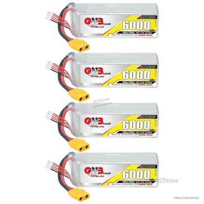 Four GNB 6000mAh LiPo batteries shown stacked vertically with XT90 connectors and balance leads