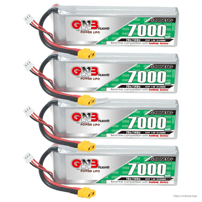 Four GNB 7000mAh LiPo batteries stacked with XT60 plugs and balance leads aligned