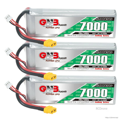 Three GNB 7000mAh LiPo batteries stacked horizontally with XT60 connectors visible