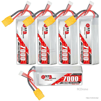 Group display of five GNB 7000mAh packs: four upright plus one horizontal showing side label