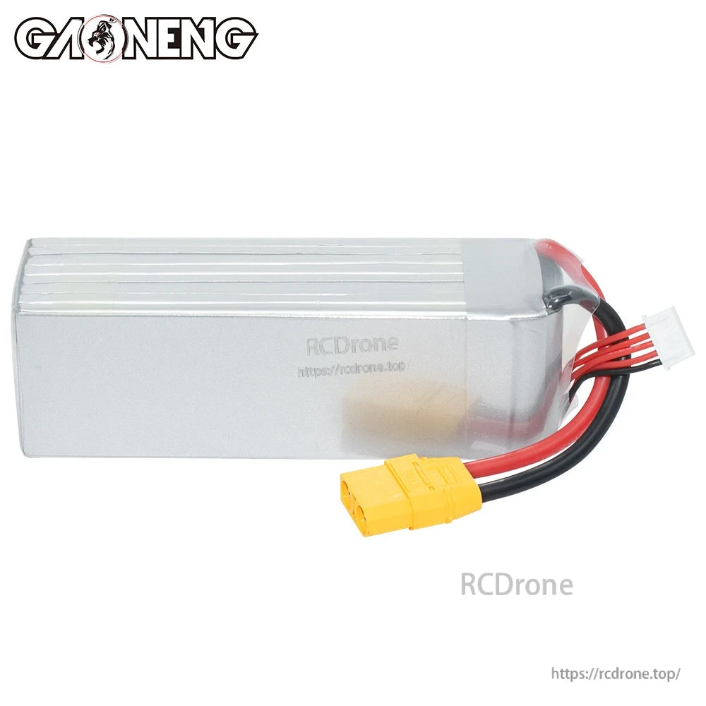 Side/back view of silver LiPo battery pack showing wiring exit, XT90 power connector and balance plug
