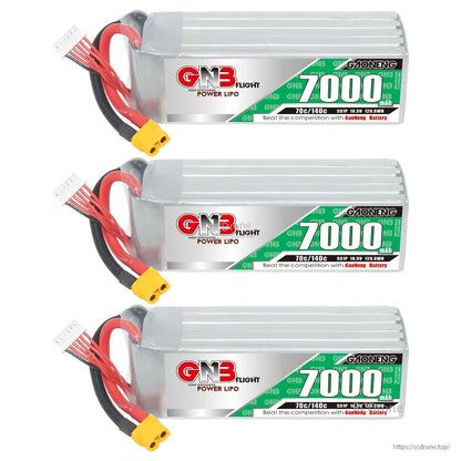 Three GAONENG 7000mAh LiPo batteries stacked, showing labels, XT60 connectors and balance leads
