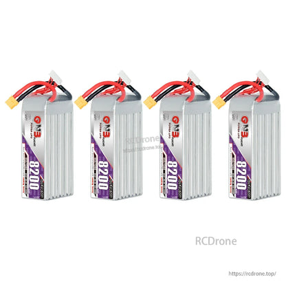 Four GNB 8200 LiHV battery packs standing upright, XT60 plugs visible