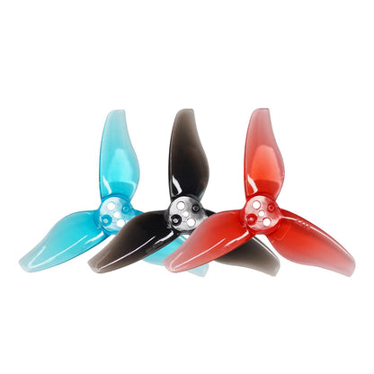 GEMFAN 2215-3 PC 2.2in 3-blade propellers in blue, black, and red, top view