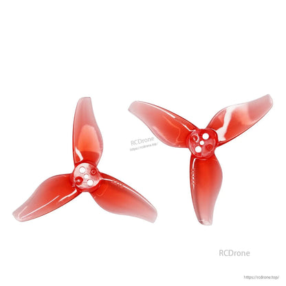Two red 3-blade propellers set, translucent finish, top view