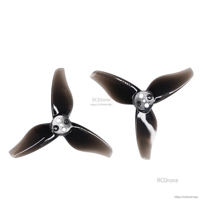 Two black 3-blade propellers set, glossy finish, top view