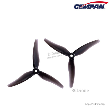 GEMFAN 51433-3 SEEKER 5 Drone Propeller, Two black GEMFAN 51433-3 Seeker 5 three-blade drone propellers with center mounting holes